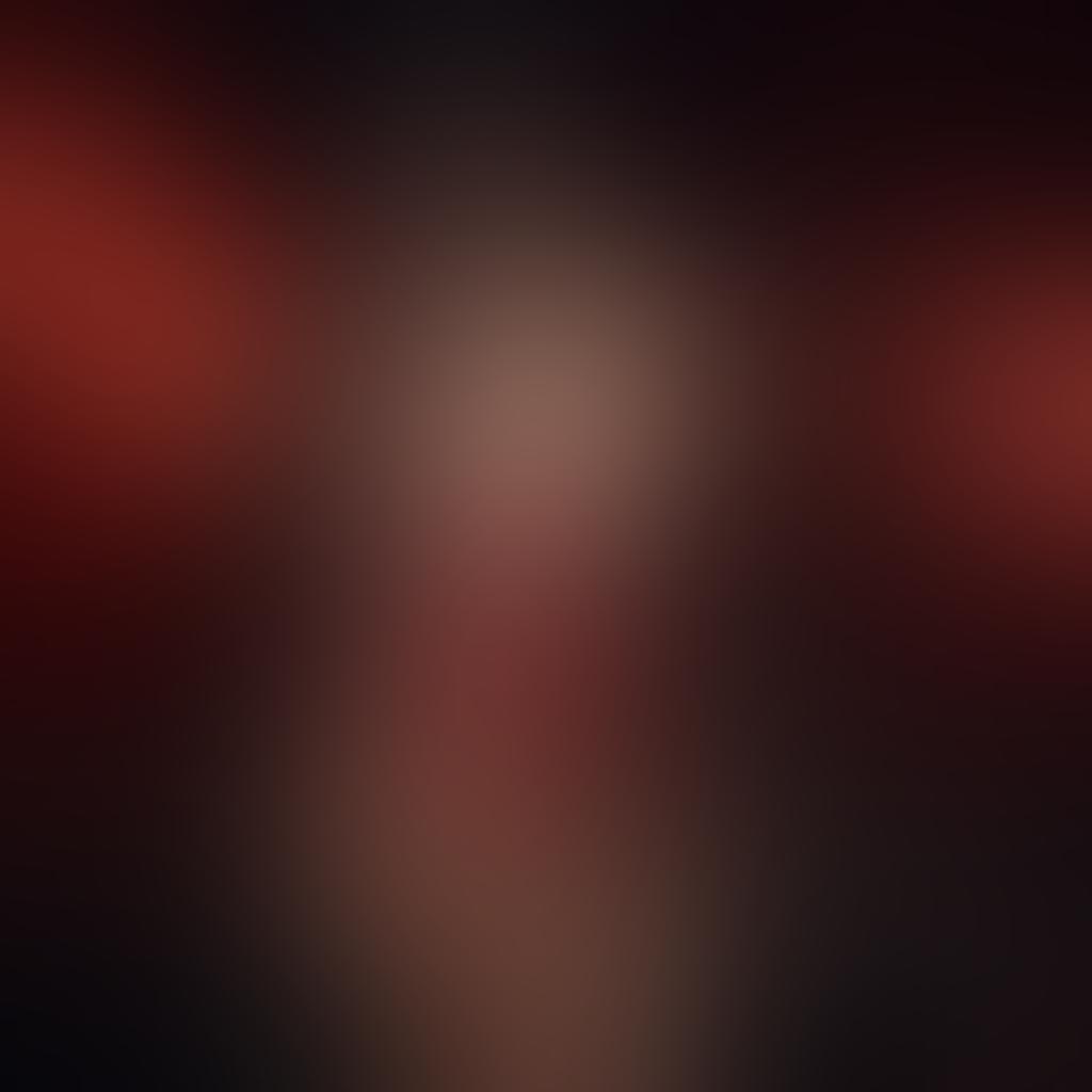 A striking composition showcasing a dark, luxurious setting with elegant swimwear models in passionate poses. The background features a moody lighting with deep reds and blacks, accentuating the allure of the swimwear. Capture a balance of sensuality and sophistication, with intricate fabric details and subtle glimmering accessories. Suggest an atmosphere of intimacy and intrigue. super-realistic. vibrant colors. gothic aesthetic.